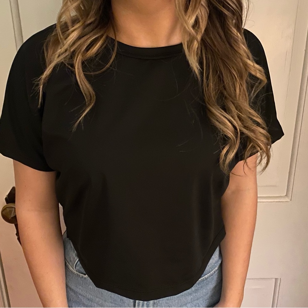 Workout top with cut out that
